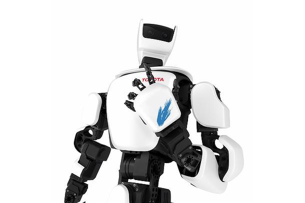 a white robot with a blue logo